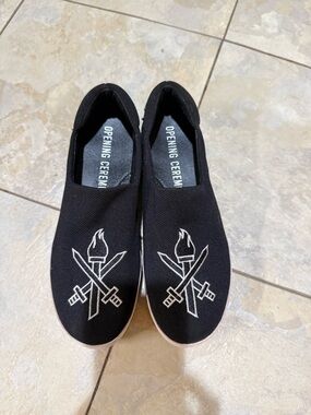 Opening Ceremony Black Slip-On Sneakers with White Torch and Saber Embroidery